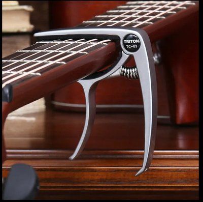 Каподастр Capo Silver для акустичної гітари, електрогітари та укулеле Capo Silver фото