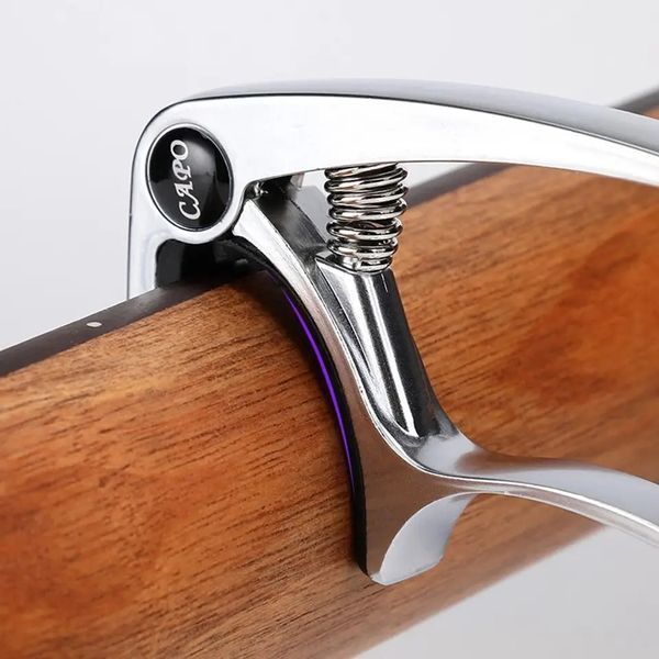 Каподастр Capo Silver для акустичної гітари, електрогітари та укулеле Capo Silver фото