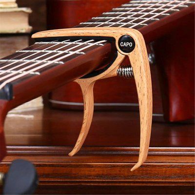 Каподастр Capo light wood (для акустичної гітари, електрогітари та укулеле) 55SML фото