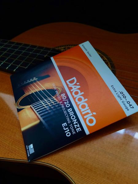 Струни для акустичної гітари D*ADDARIO EJ-10 (10-47) bronze Extra Light Tension 0153 фото